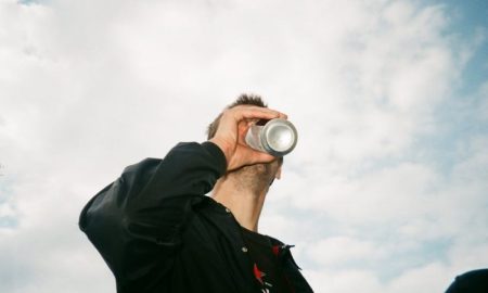Coors light pride can - Man drinking can